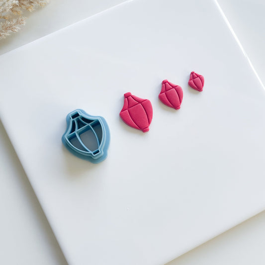Our Lantern polymer clay cutters are made with sharp cutting edges to minimize the need for sanding for clay artists. 
Measurements are from the longest sides.
