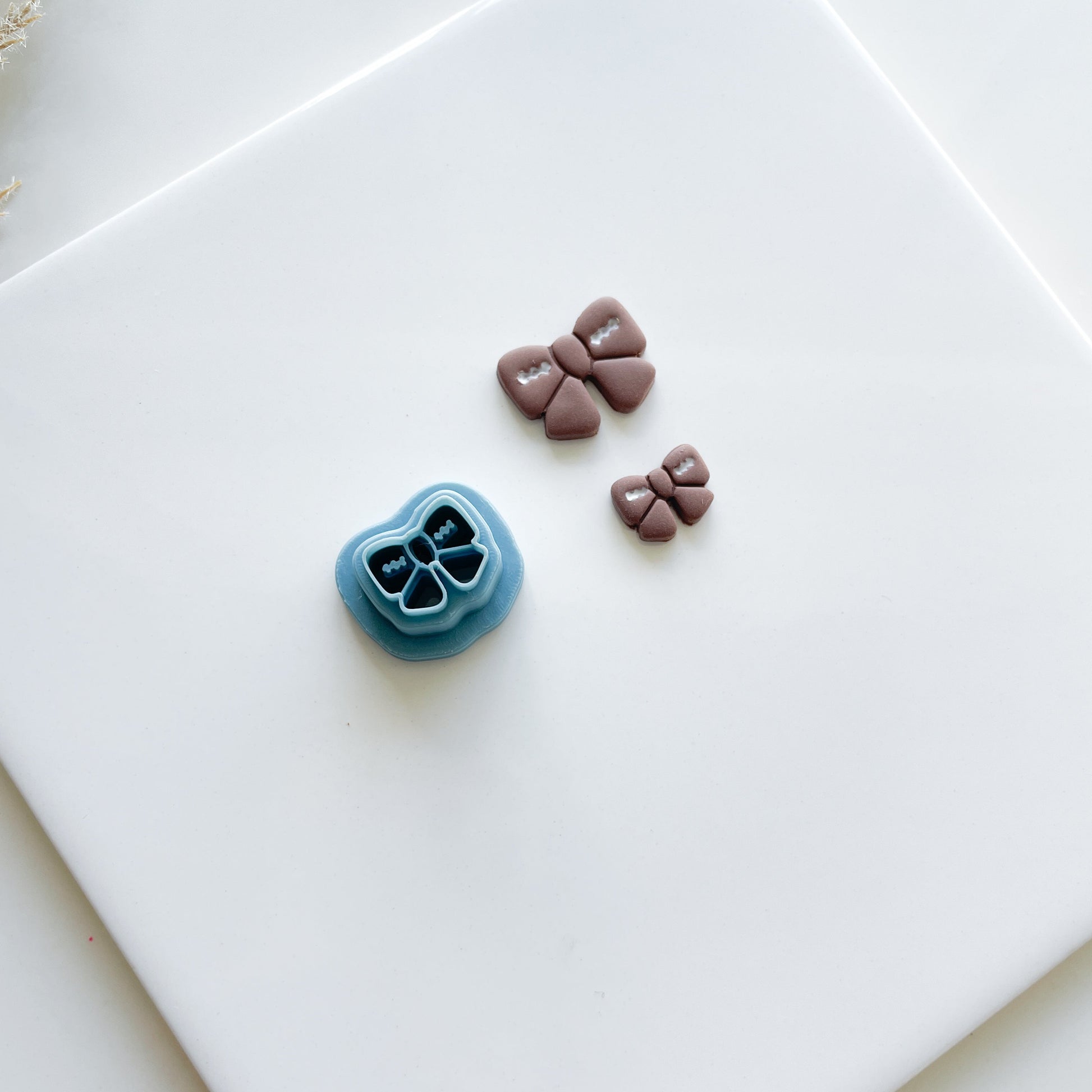 Football Bow Stud Clay Cutter