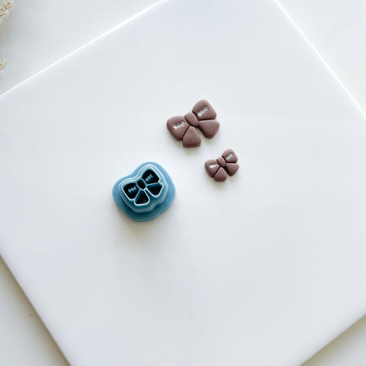 Football Bow Stud Clay Cutter
